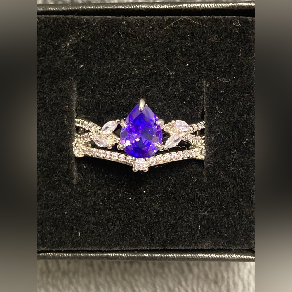 Silver Ring with Deep Purple Teardrop Stone